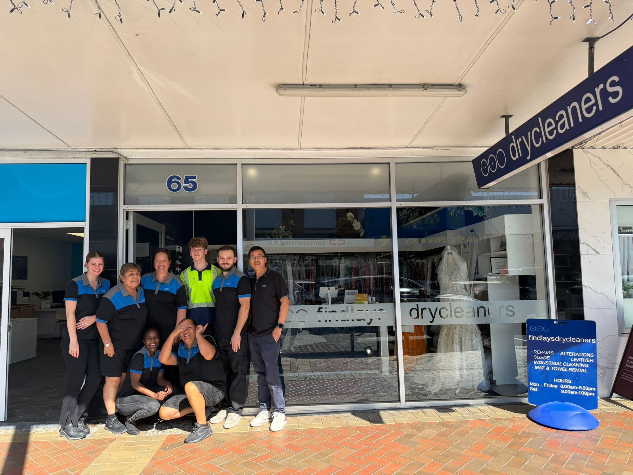 The Findlay's Drycleaners team outside the Pukekohe store